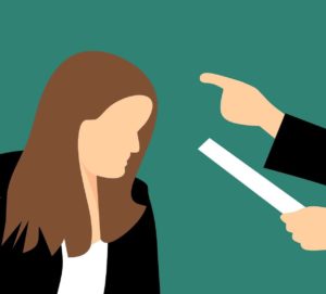 Illustration of a women being reprimanded by another person