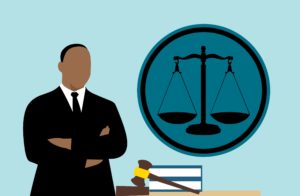 Illustration of a judge with gavel and scale of justice